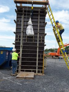 men using pully lift