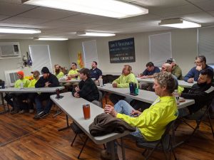 construction crew in meeting room